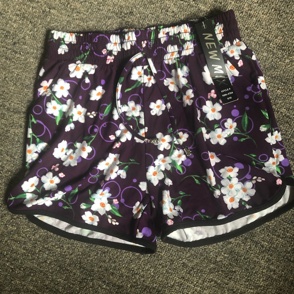 Purple floral dolphin shorts pockets